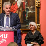 P. Gregory Warden, Mark A. Roglán Director of the Custard Institute for Spanish Art and Culture, Meadows Museum, SMU, delivers remarks at the opening of the institute’s new facilities while Peter M. Miller, President & CEO, The Meadows Foundation, Linda P. Custard, SMU Trustee Emerita and chair, Meadows Museum Advisory Council, and William A. Custard look on, October 4, 2023. Photo by Guy Rogers III.