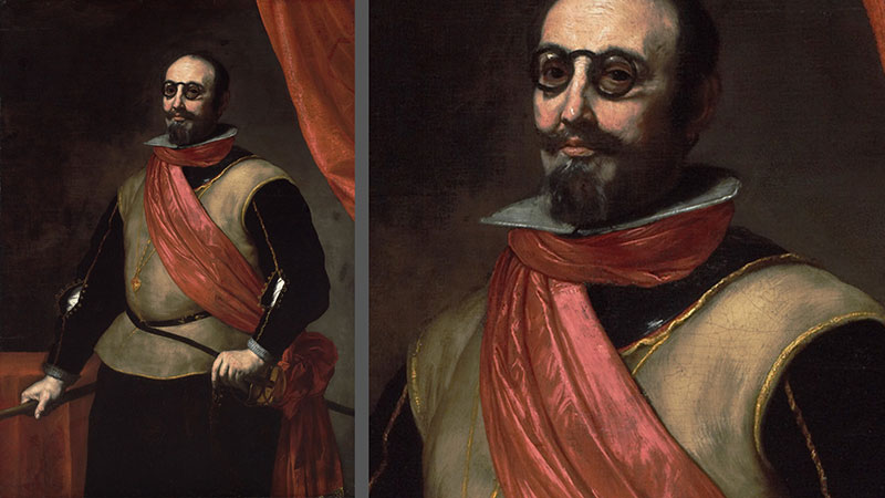 Portrait of a Knight of Santiago: painting of a middle-aged white man with short black hair and thick round framed glasses, wearing period Spanish garb with red sash across body and high neck, wearing a sword by side and holding a rail against a brownish background